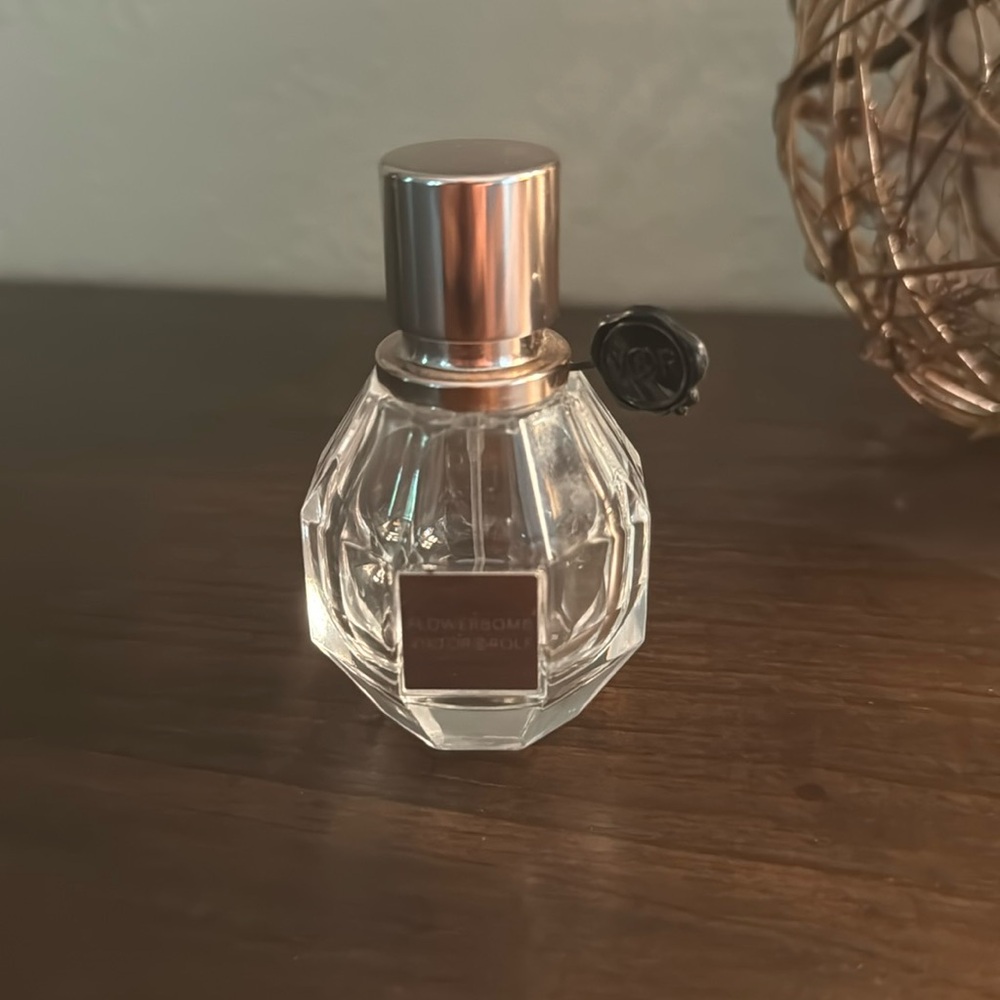 Authentic empty bottle of Viktor and Rolf Flower Bomb Eau de Parfum Spray